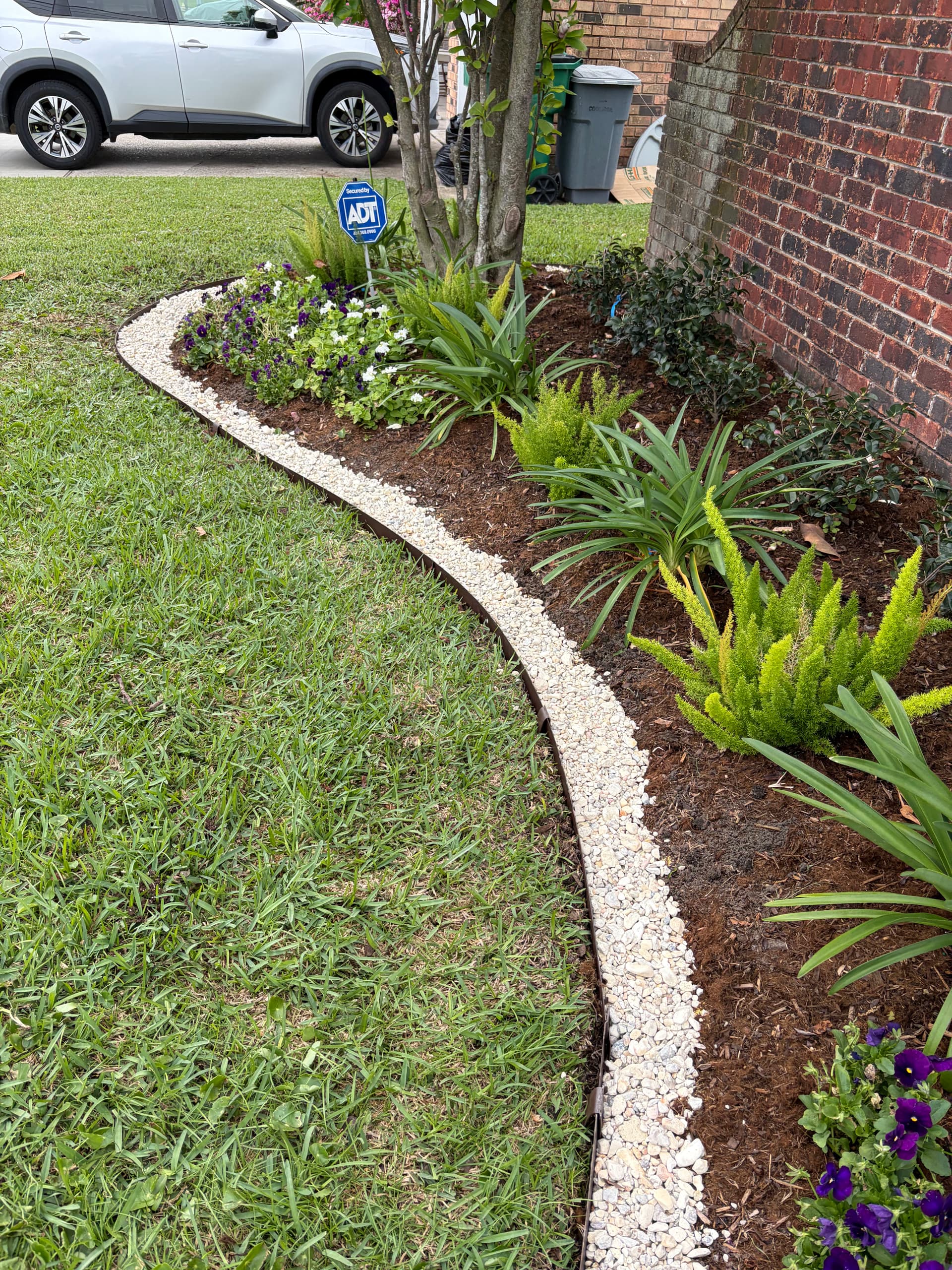 Gallery photos for Elegant Garden Makeover with Metal Edging and River Rock Delight: Image #1