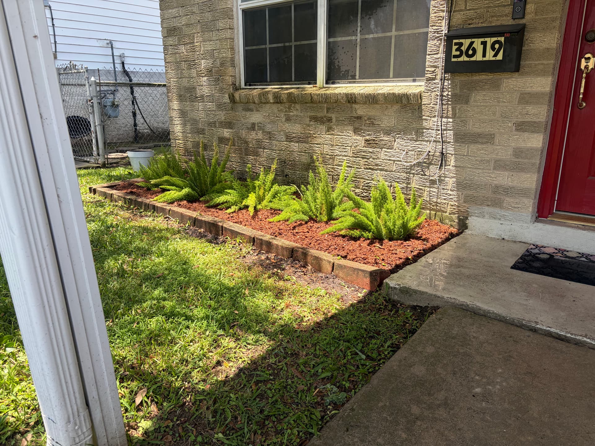 Gallery photos for Fresh Mulch, New Plants, and Trimmed Boxwoods Make This Front Yard Pop: Image #2